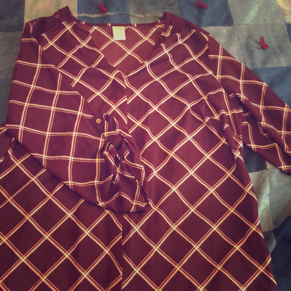 Hidden button down v-neck shirt.